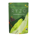 A stand-up pouch of RYZE Mushroom Matcha on a plain white background. The packaging is primarily green with abstract brushstroke graphics in yellow-green, white, and dark green, along with small orange and yellow paint splatters.